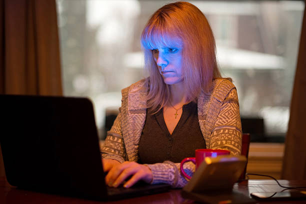 istock Woman Using Seasonal Affective Disorder (SAD) Light 531268631