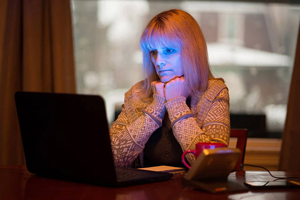 istock Woman Using Seasonal Affective Disorder (SAD) Light 531268635