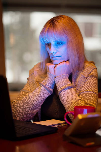 istock Woman Using Seasonal Affective Disorder (SAD) Light 531268637