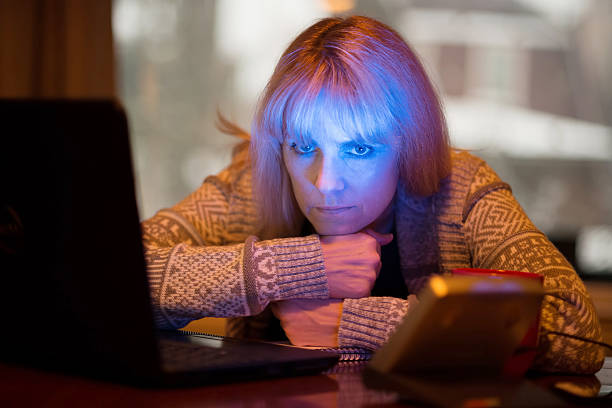 istock Woman Using Seasonal Affective Disorder (SAD) Light 531268643