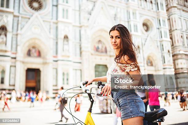 Beautiful Tourist With Bike On The City Stock Photo - Download Image Now - 2015, 25-29 Years, Adult