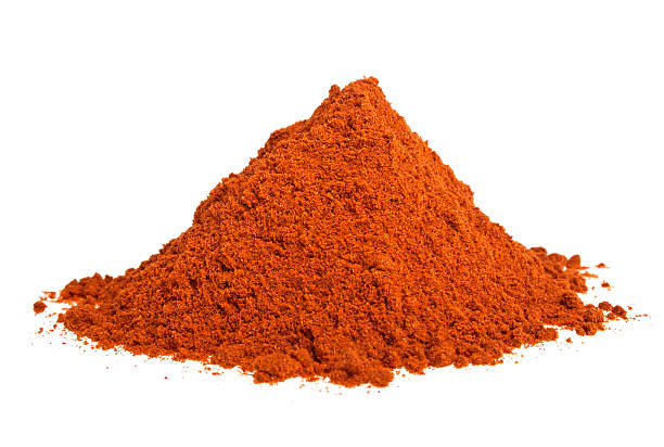 istock Powdered red pepper pile on white background 531278253