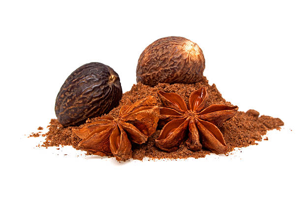 istock Anise and nutmeg with its powder on a white background 531278445