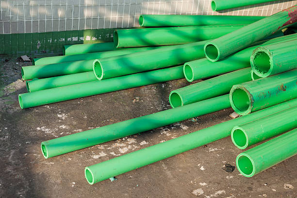 Green color plastic tubes for industry Green color plastic tubes for industry . rustproof stock pictures, royalty-free photos & images