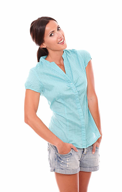 istock Pretty brunette lady in short jeans looking at you 531281661