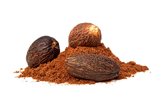 istock Nutmeg and its powder isolated on a white background 531281993