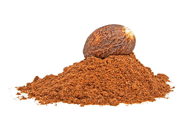 istock Nutmeg and its powder isolated on a white background 531282005