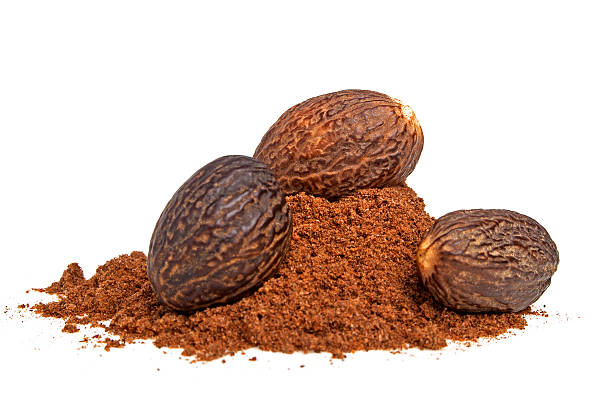 istock Nutmeg and its powder isolated on a white background 531282029