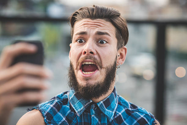 istock young handsome bearded hipster man selfie 531289299