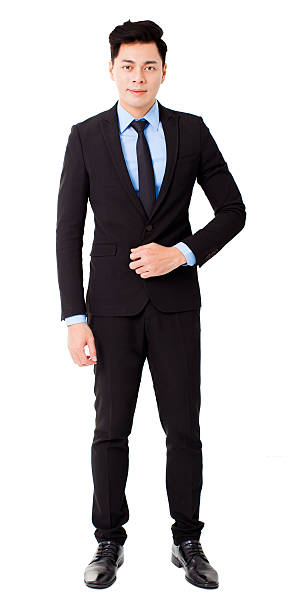 istock young businessman standing and isolated on white 531290473