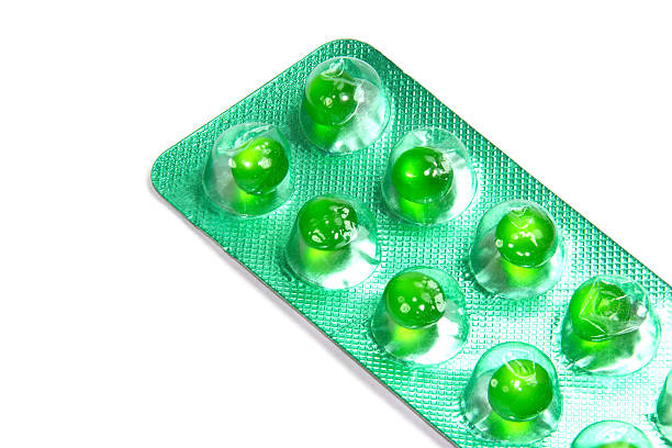 istock Green flatulence pill in the blister pack 531303014
