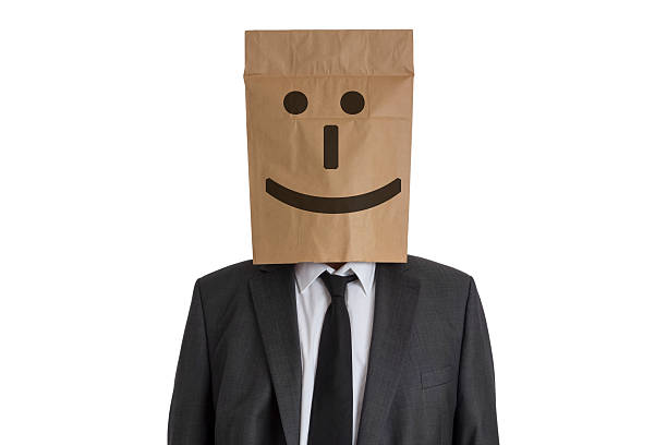 istock Man with Paper Bag with smiley on his head 531304035