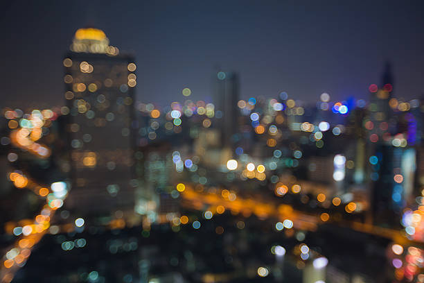 istock Blurred bokeh lights, aerial view office building downtown 531304932