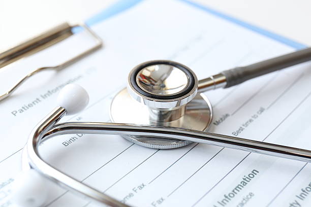istock Medical record and stethoscope 531305112