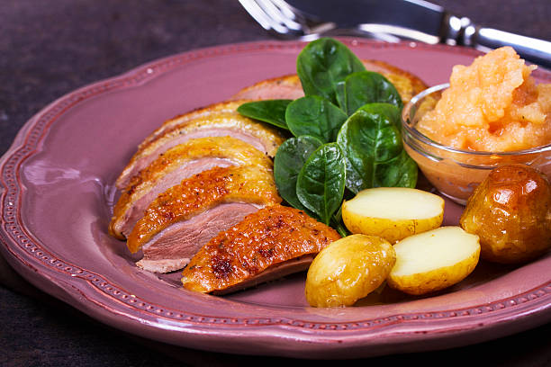 istock Spiced slow roast duck, apple sauce, spinach and potato 531306204
