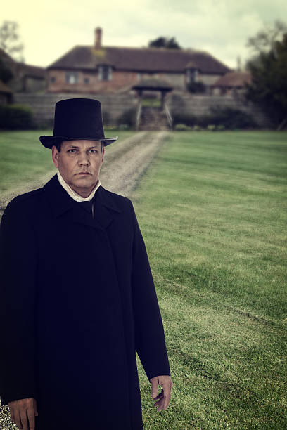 istock era 1800 man with manor house 531306550