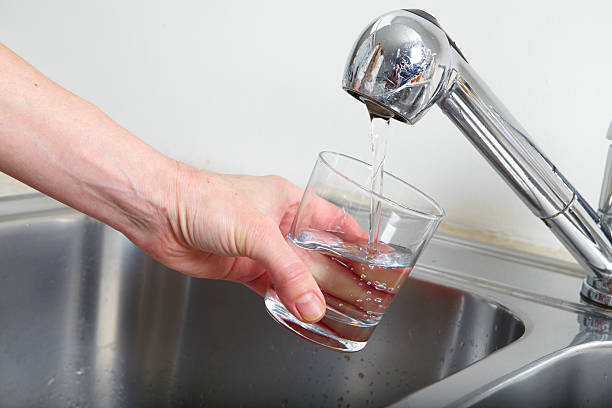 istock Filling glass of water 531306804
