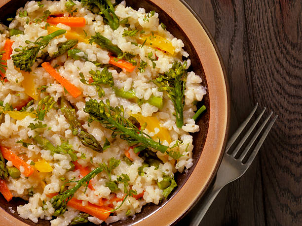 istock Vegetable Risotto with Fresh Parsley and Focaccia Bread 531310330