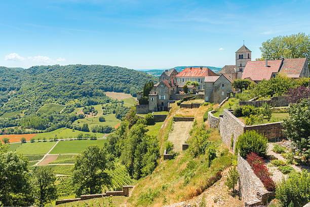 View of the picturesque medieval village in valley. View of the picturesque medieval village in valley. Chalon, Departement Jura, Franche-Comte, France jura stock pictures, royalty-free photos & images