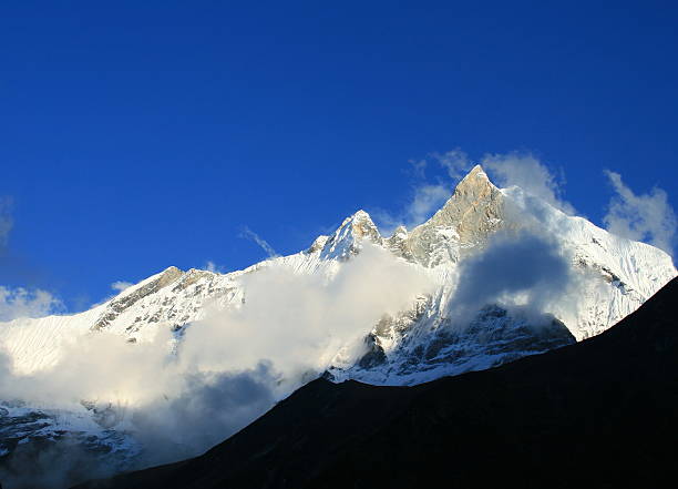 istock Mount Machhapuchhare, the fish tail, in evening clouds, Pokhara, Nepal 531314897