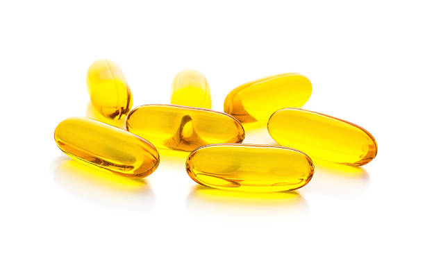 istock Fish oil capsules isolated on white background 531318249