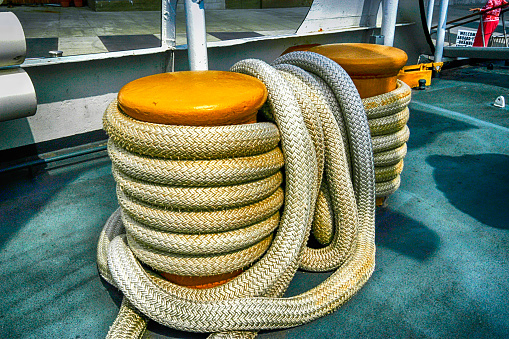 Large Rope Tied Neatly Around A Ships Cleat Stock Photo - Download Image  Now - Anchored, Attached, Boat Deck - iStock