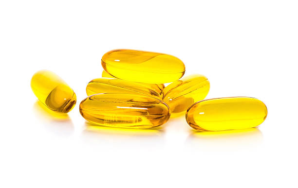 istock Fish oil capsules isolated on white background 531318351
