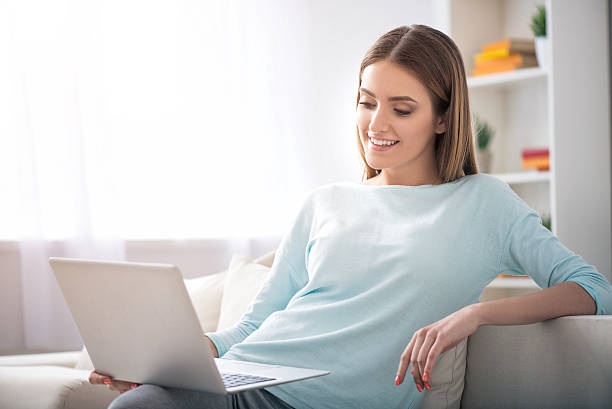 istock Positive woman working on the laptop 531318444