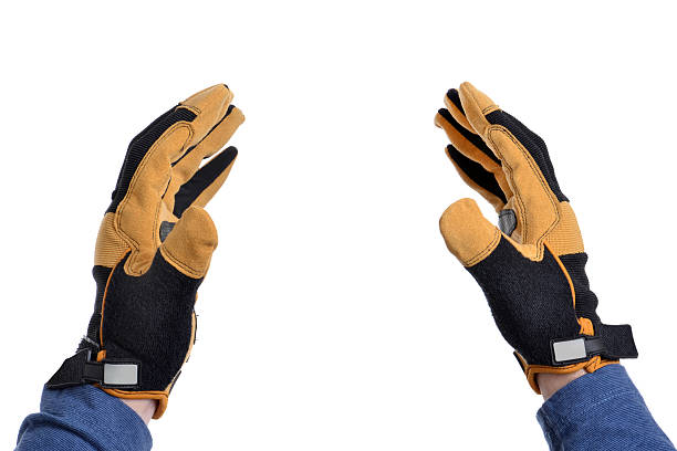 guantes - gloved hand fotografías e imágenes de stock