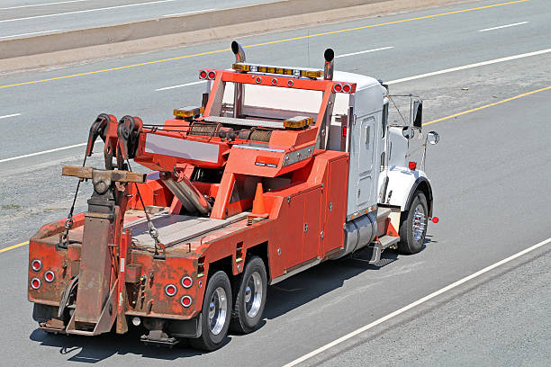 istock Heavy Duty Tow Truck Travelling On An Interstate Highway 531318714