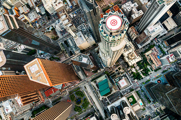 Los Angeles from above Roof tops and city streets of Los Angeles, CA viewed from the air. los angeles aerial stock pictures, royalty-free photos & images