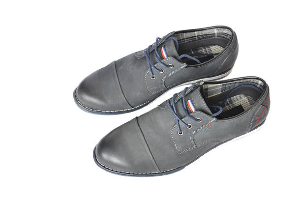 istock Black leather shoes for men isolated on white 531319346
