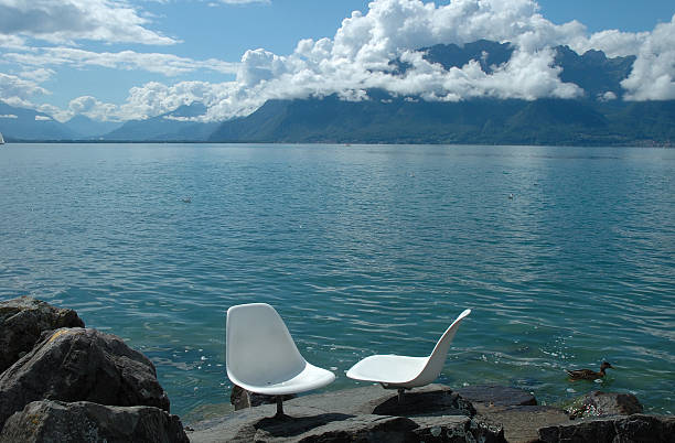 istock Two white chairs at Geneve lake 531321169