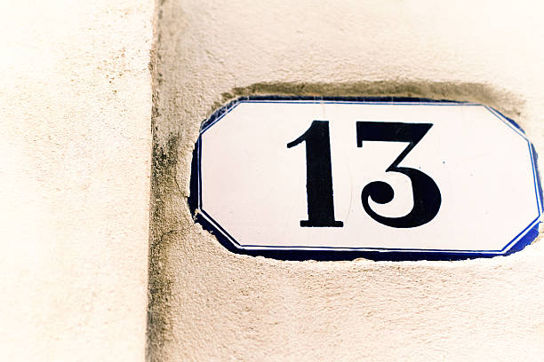 istock Number 13 Vintage Ceramic Address Tile On White Wall 531321542