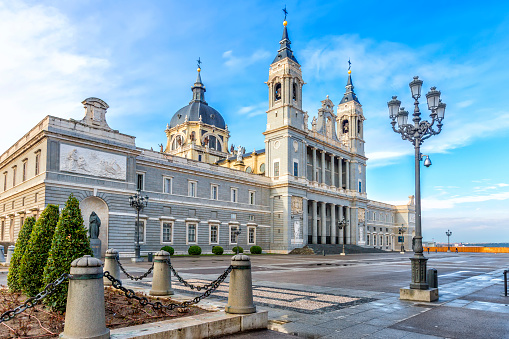Cathedral Almudena on the blue sky background, designed by Francisco de Cubas.  Madrid, Spain