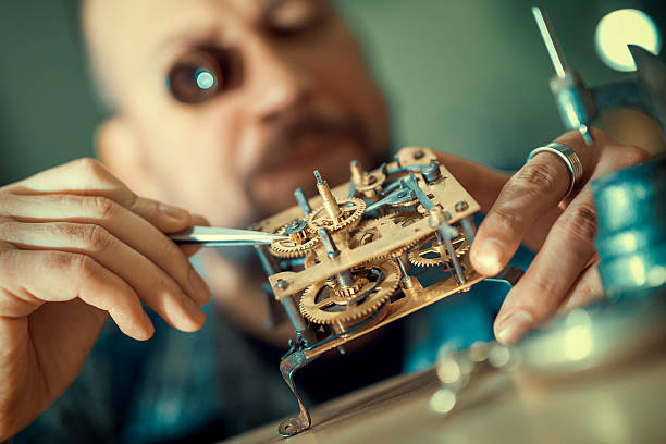 istock Close up portrait of a watchmaker at work 531322118