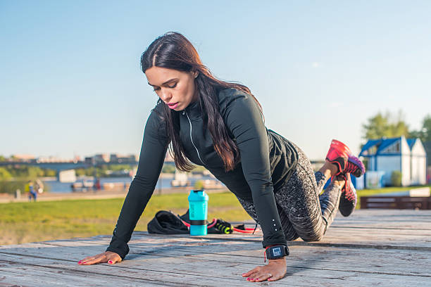istock Fitness woman doing knee push-ups or press ups exercise 531324876