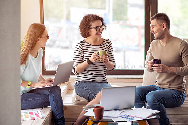 istock Cheerful colleagues sitting in the office 531325198