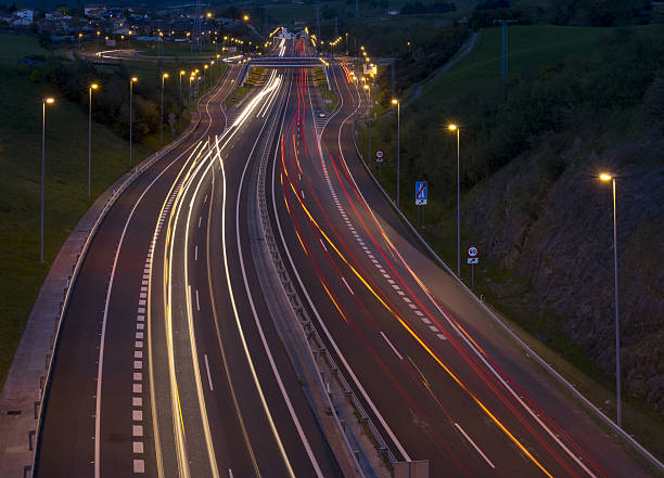istock the light trails on the street at night. 531327034