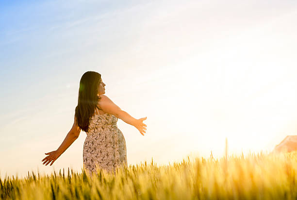 istock Pregnant woman enjoying sun 531327708