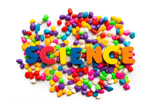 science word in colorful stone