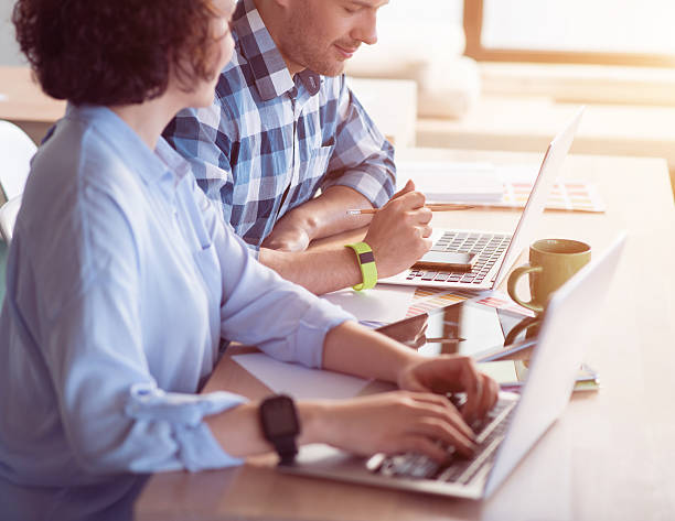 istock Positive colleagues working in the office 531329400