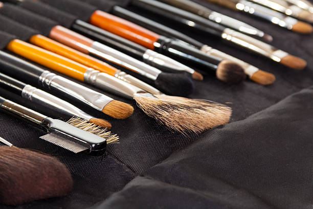 istock Set  cosmetic brushes for make-up on  background  dark fabric 531329654