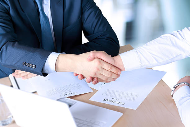 istock Close-up image of a firm handshake between two colleagues 531330108