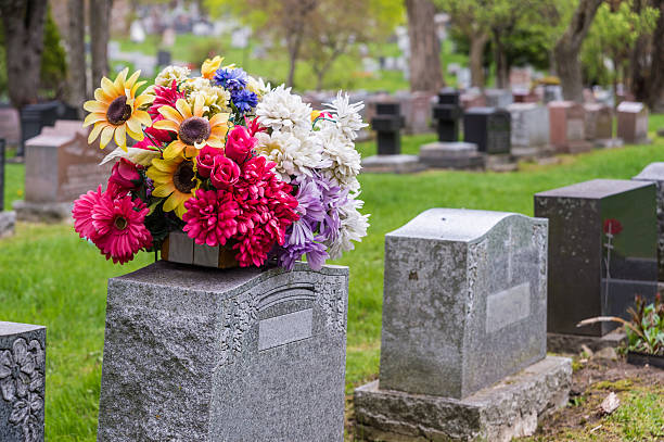 Family cleaning the grave