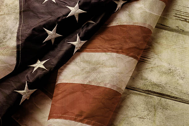 istock Old and crumpled american flag. 531331812