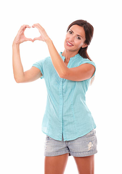 istock Beautiful girl making a love sign 531332937