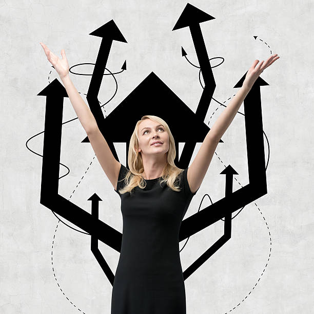 istock woman with arrow tree over head 531334565