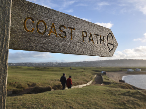 Southwest coast path sign on the burrows between Westward Ho and Northam, near Bideford in North Devon