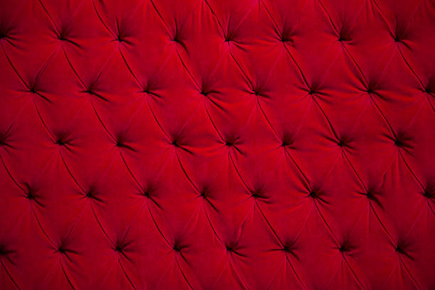 istock Red quilted plush velvet couch 531344883